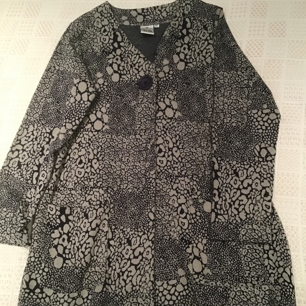 Tunic style jacket with organic fabric design